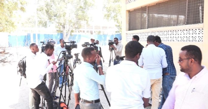 Local journalists gather outside parliament after they were denied access on Saturday 19 October, 2019. | Photo/Courtesy/Private.