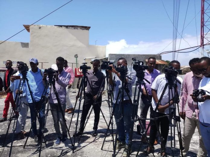 Journalists cover a press conference by the journalists union leaders on Monday 18 May, 2020.