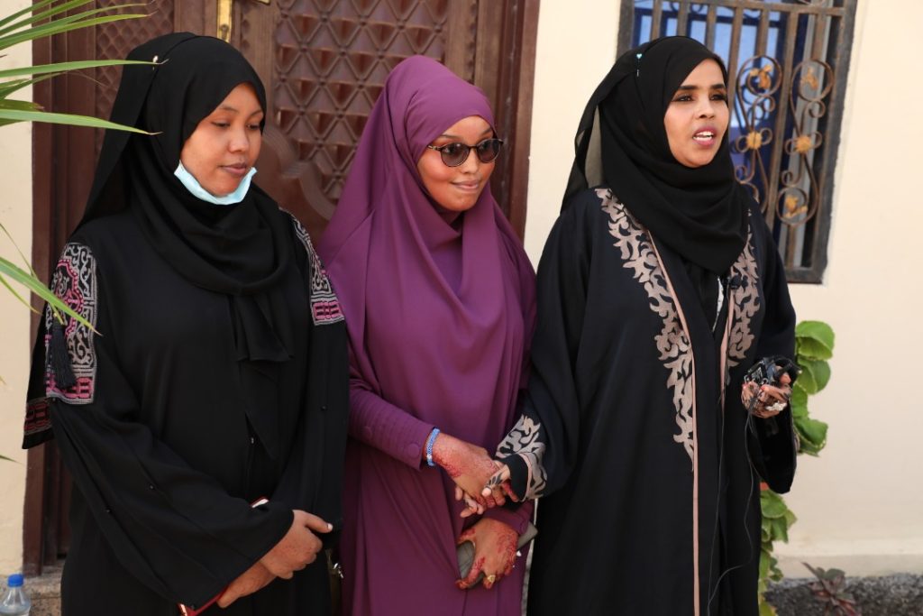 SJS Gender Secretary, Hinda Dahir (right) and SJS Labour Rights Secretary, Fathi Mohamed (left) congratulate Faisa Abdi Warsame (centre) shortly after he election victory. (PHOTO/ SJS).