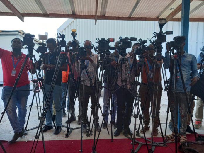 Journalists gather during protests in Mogadishu on 20 February 2021.