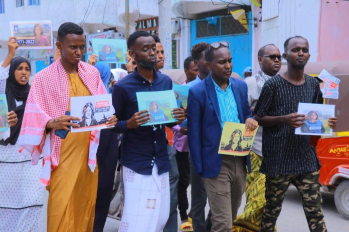 SJS and SOMA leaders join journalists during a protest condemning the killing of Al-Jazeera Arabic journalist, Shireen Abu Akleh.