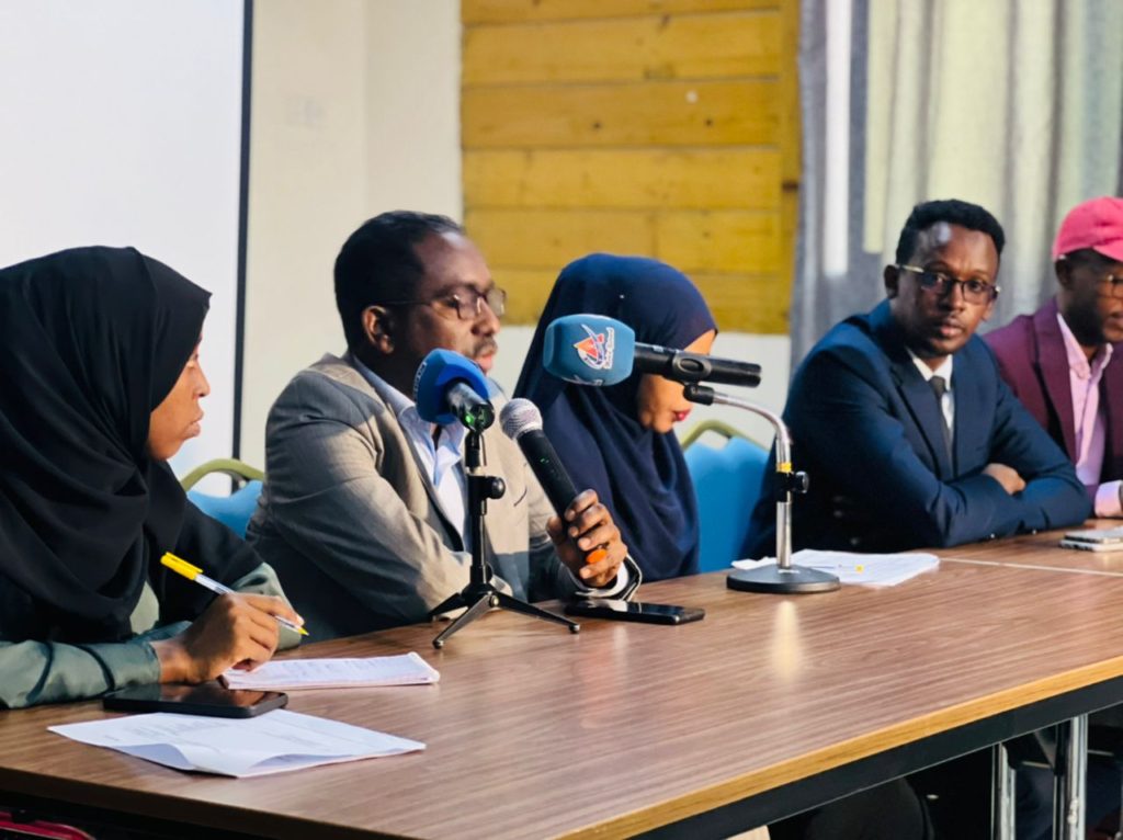 SJS Secretary-General, Abdalle Mumin (second left) speaks speaks during a panel discussion to wrap up a three-day training of women journalists supported by German Embassy, on Friday 19 August, 2022. | PHOTO/SJS.