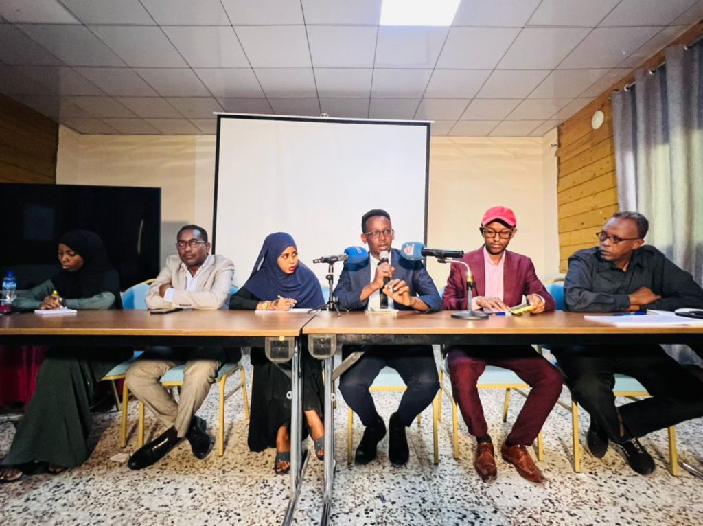 Director of state-owned Radio Mogadishu, Mohamed Kafi Abukar (third from right) speaks during a panel discussion to wrap up a three-day training of women journalists supported by German Embassy, on Friday 19 August, 2022. | PHOTO/SJS.