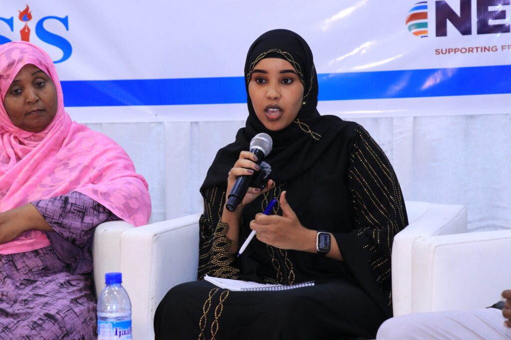 SJS Secretary of Gender, Anfa Aden Abdi speaks during a panel discussion on human rights held in Mogadishu, Somalia on 10 December, 2023. |Photo/SJS.