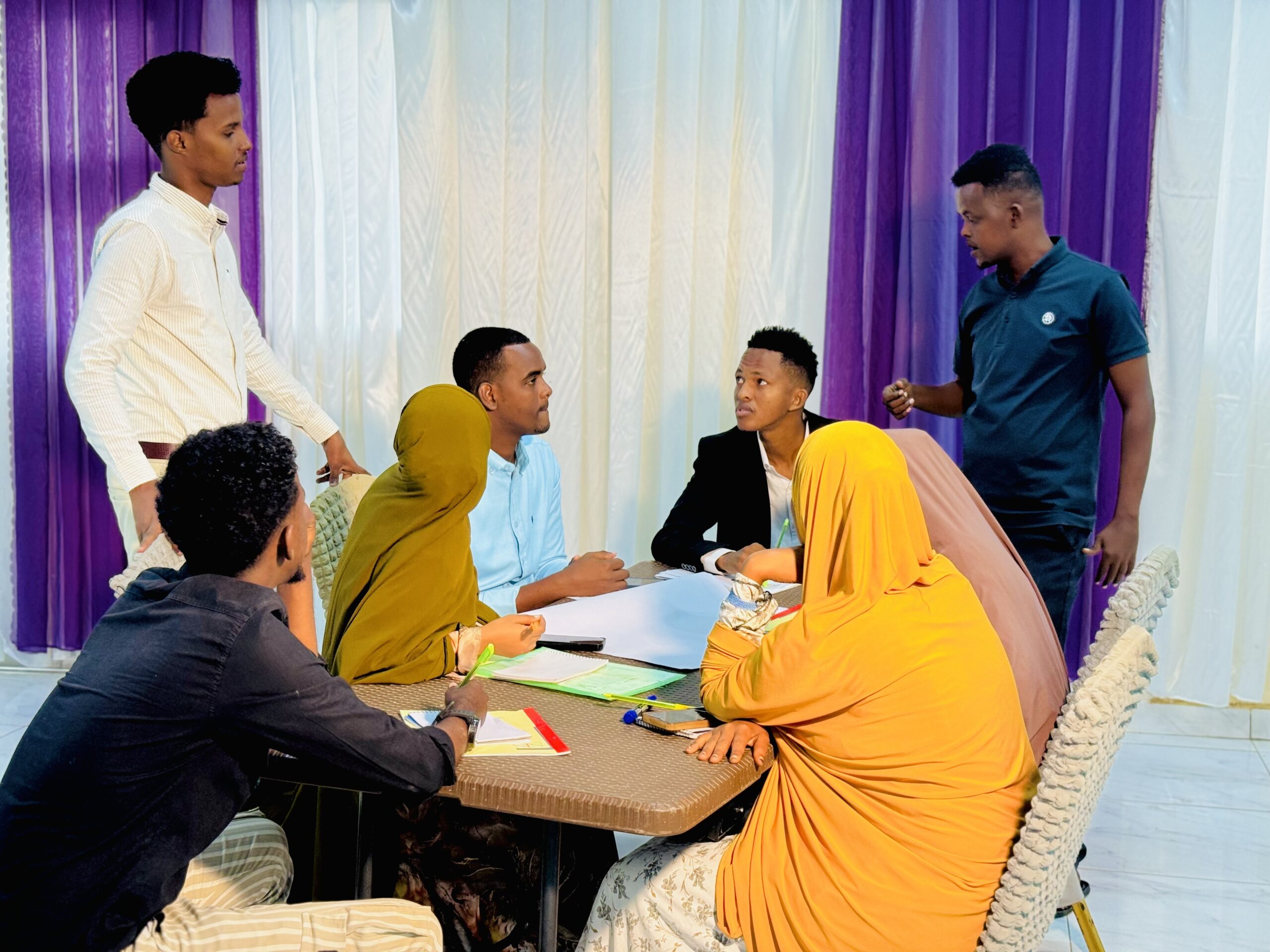 Journalists gather for a training activity during the three-day journalists training on climate change and climate justice in Baidoa from 22-24 July, 2024. | PHOTO Credit/SJS.
