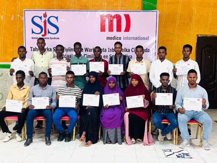 Journalists in Beledweyne gather for a group photo after completing a three-day SJS training on climate change reporting. | PHOTO/SJS