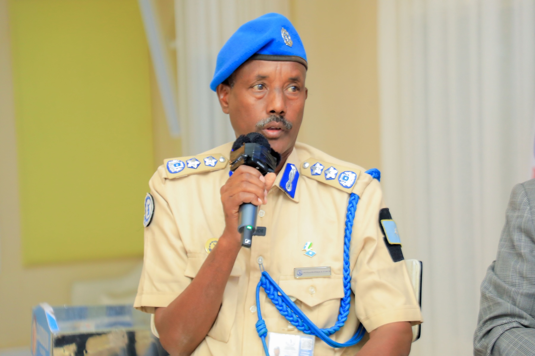 Puntland police officer, Abdi Darwiish speaks during SJS panel discussion in Garowe, 10 December, 2024. | PHOTO/SJS.