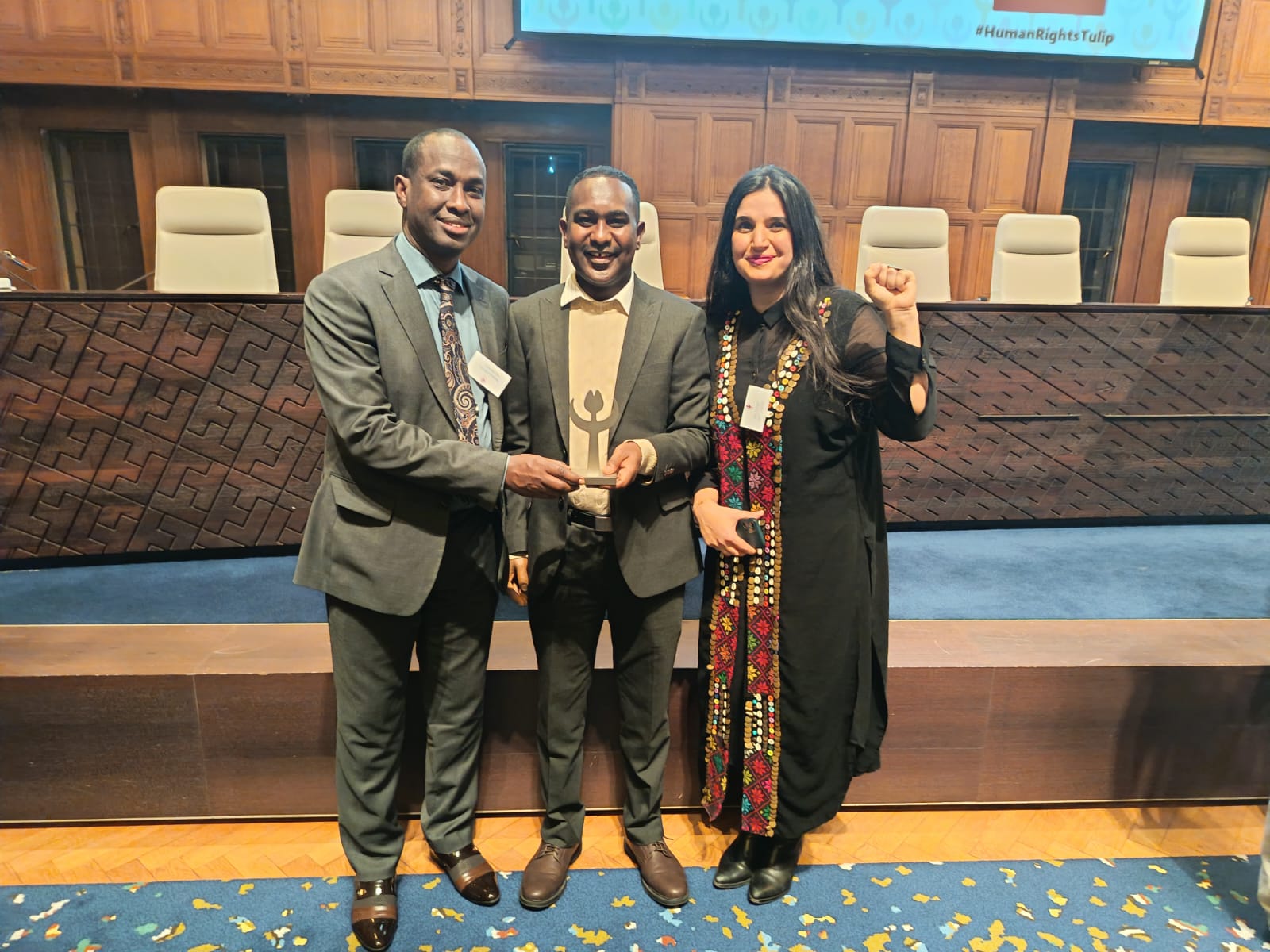 Moment of celebration with Maral Khajeh from Shelter City in The Hague. | PHOTO/SJS.