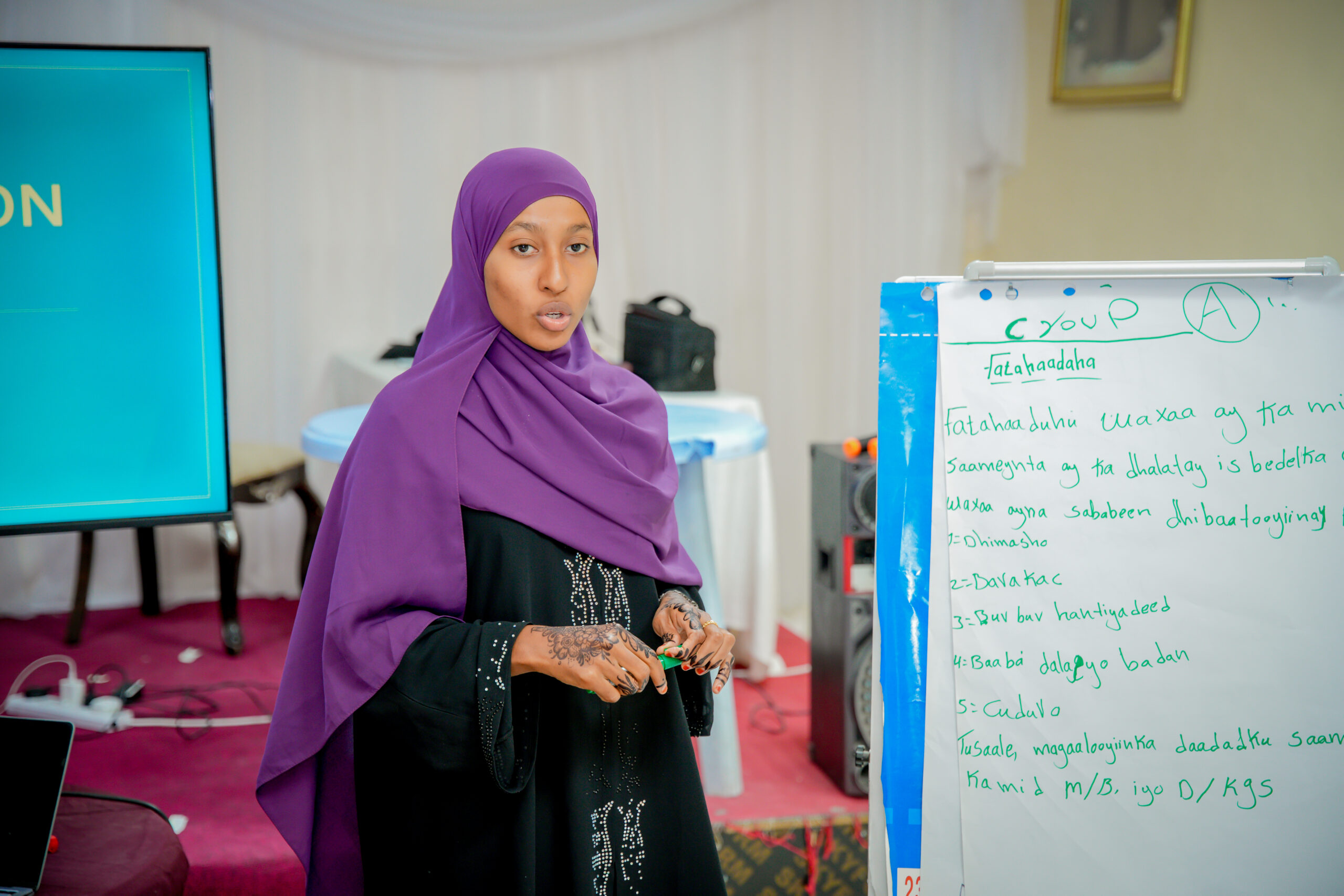 Nurto Mohamed Hassan makes a presentation during the two-day training on climate change reporting in Mogadishu. | PHOTO/SJS.