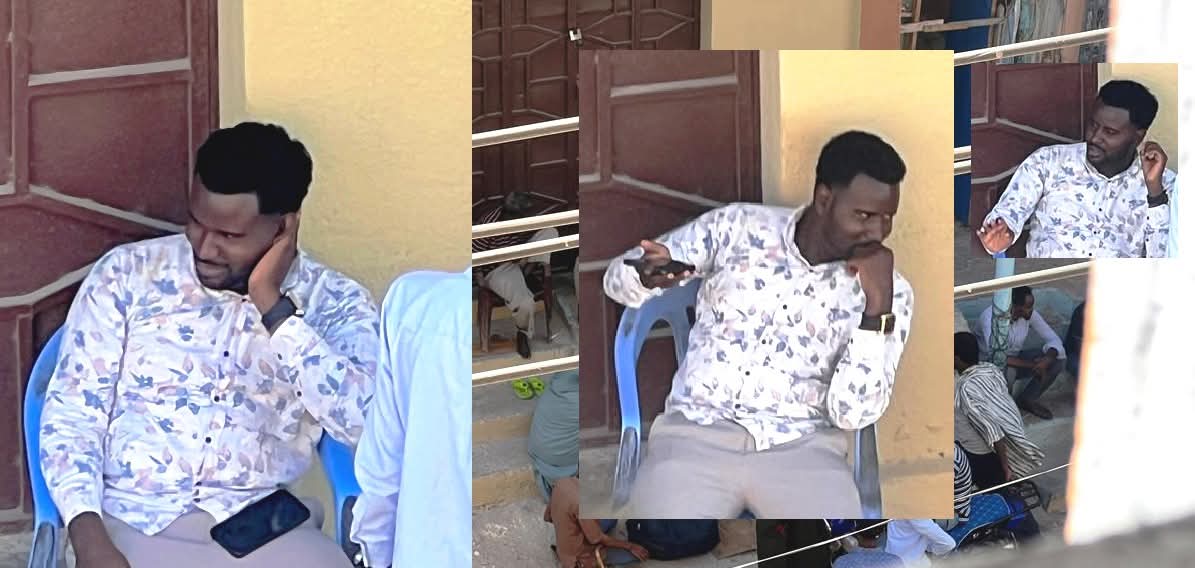 On 31 January 2026,A NISA officer is seen seated at the entrance of Radio Risaala premises, blocking journalists’ access. | PHOTO/Radio Risaala.